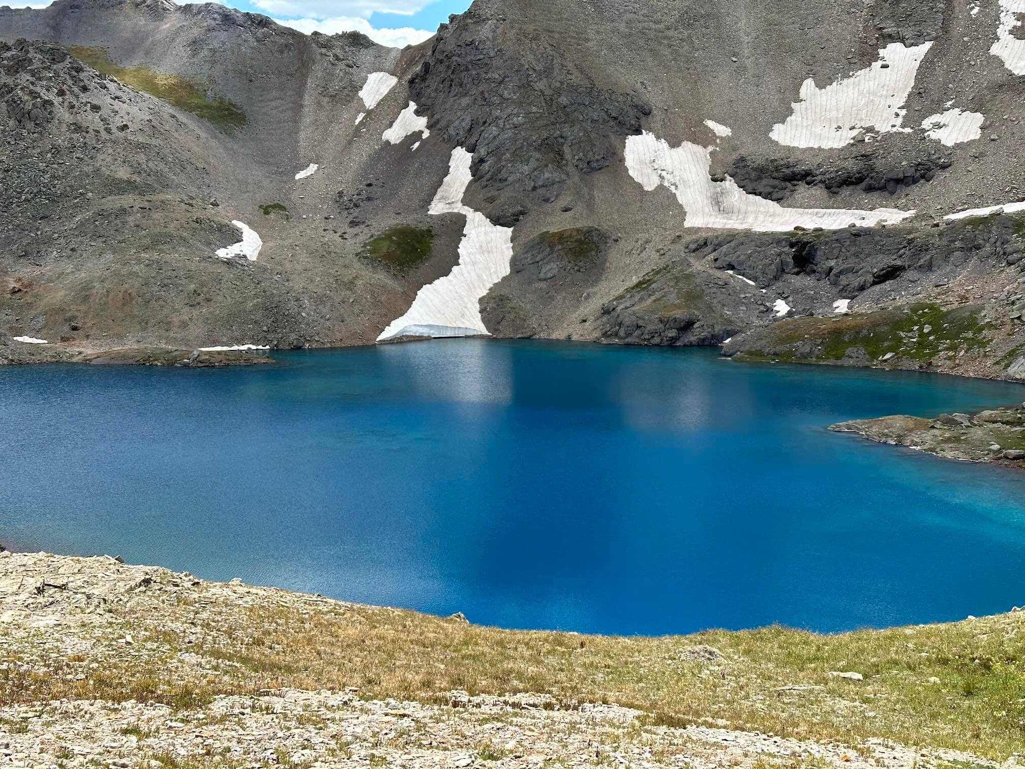 Columbine Lake, after going over the pass and crossing the high alpine tundra.