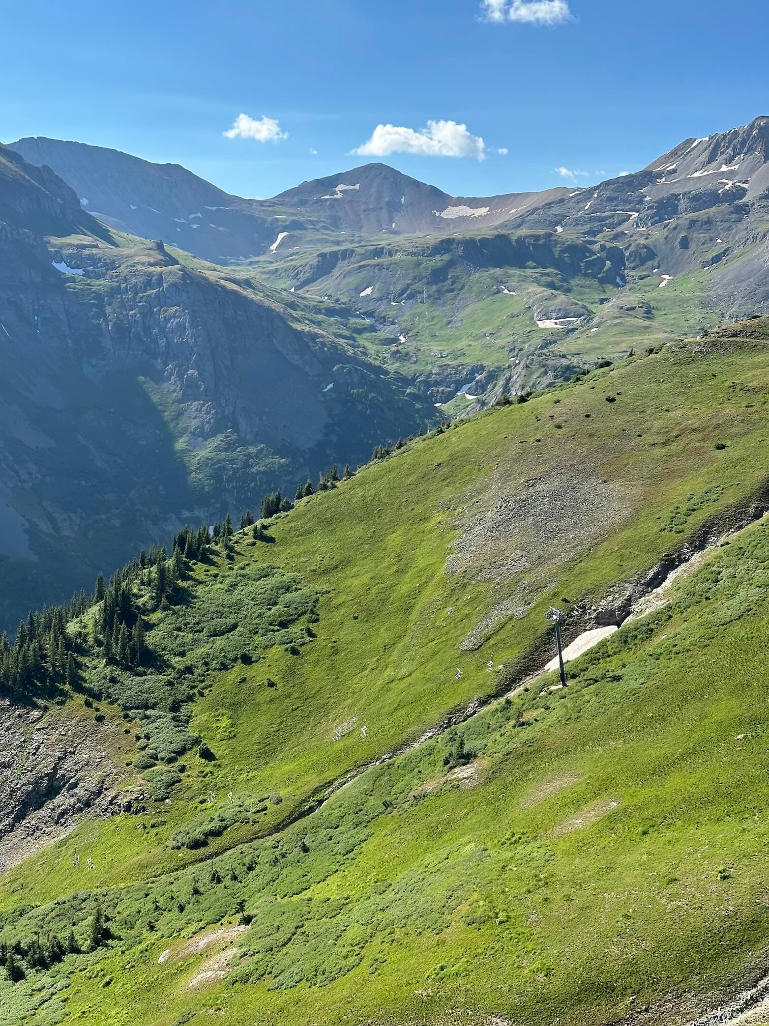 Looking east across Revelation Bowl. Trail runs along the top of the bowl.