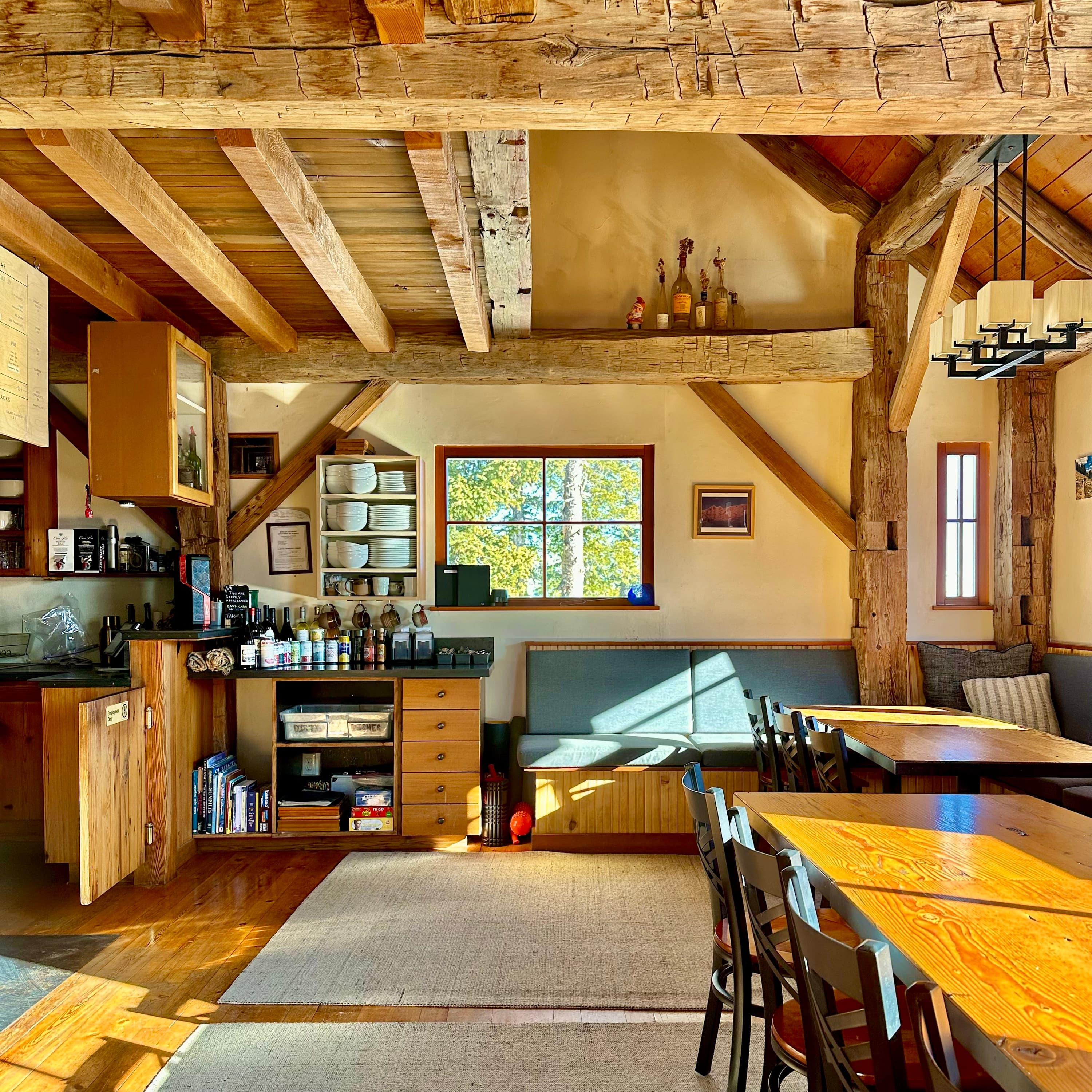 Sunlight across the common room and long table