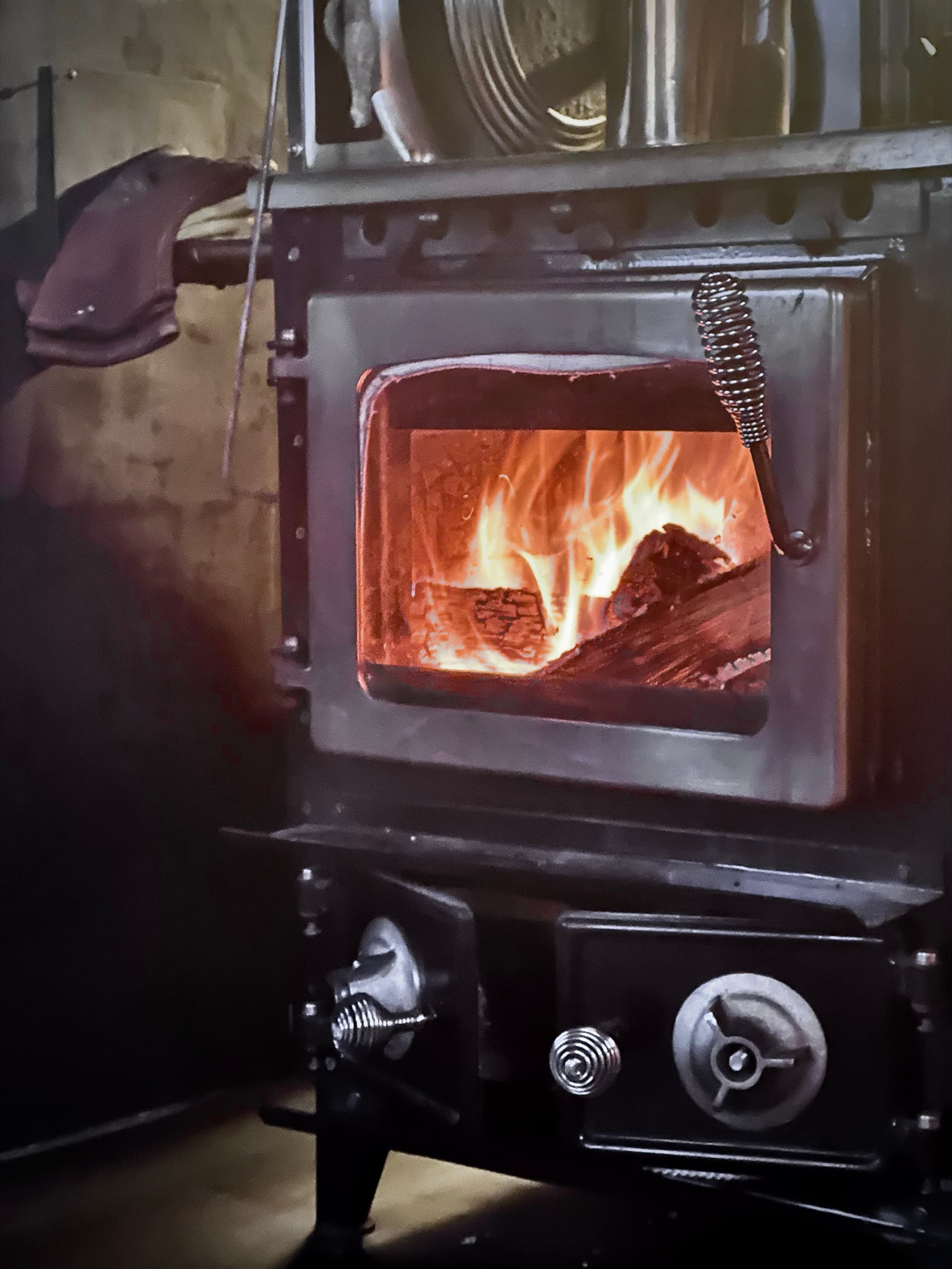 The wood stove where afternoon soup stays warm